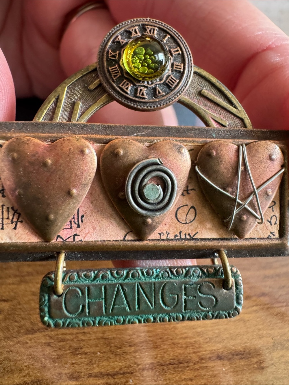 Source Unknown Bronze-Tone Brooch with Green Accent 'CHANGES'